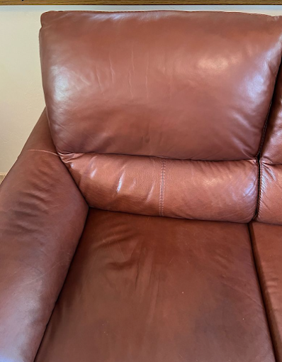 Restored brown leather chair after recoloring in Tucson AZ