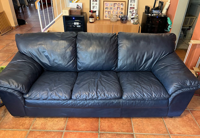 Restored blue leather sofa after leather color repair in Tucson AZ